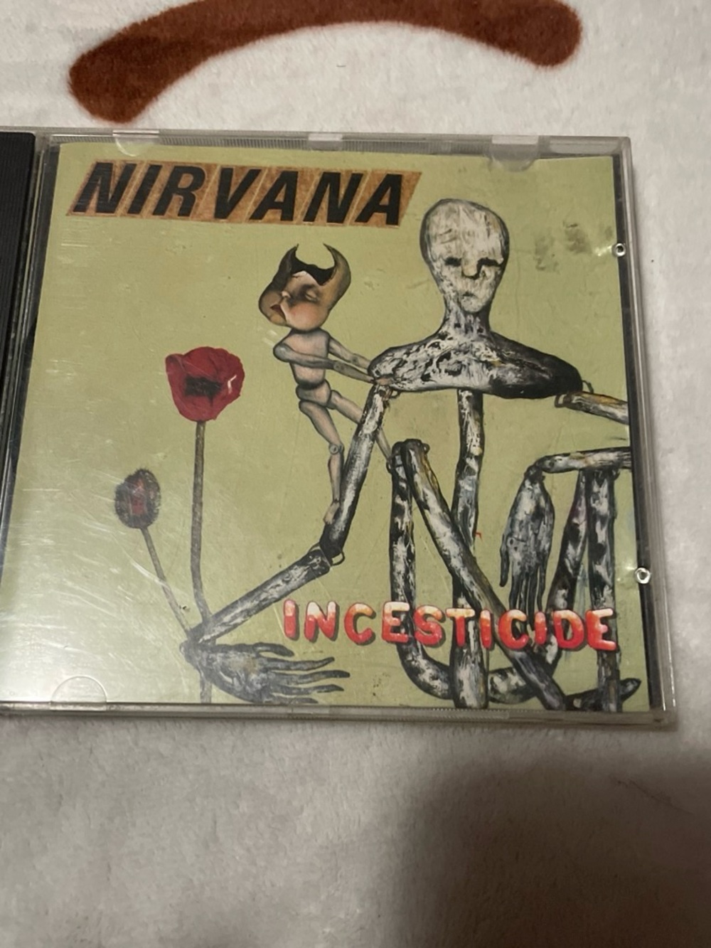 NIRVANA Incesticide CD Olive Green Album Cover with Red Accent - Incesticide